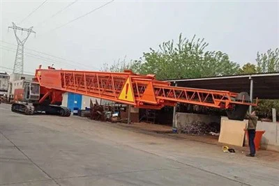 Gusjeničarski teleskopski mobilni slagač